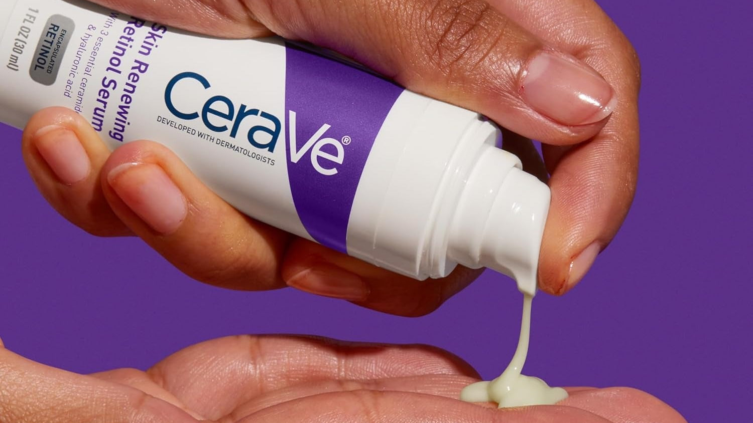 CeraVe skincare serum being applied to a hand against a purple background